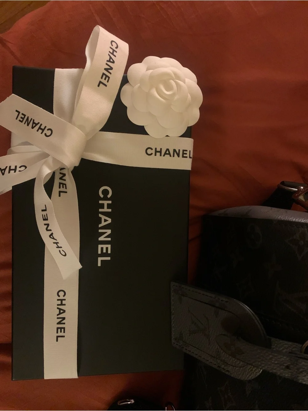 CHANEL Black Chevron Zip Around Wallet with Silver CC Emblem